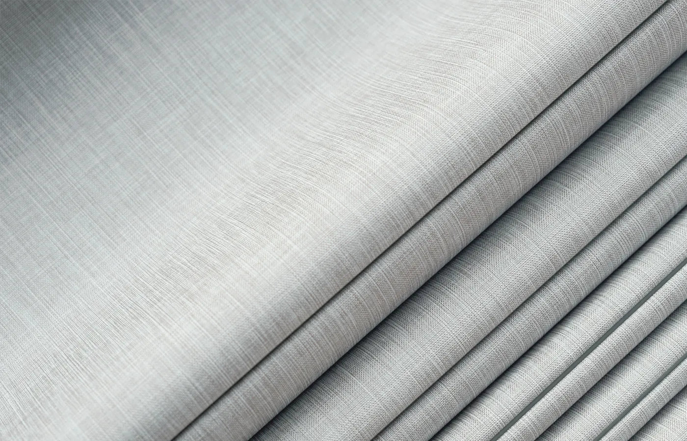 Premium blackout fabric with elegant folds enhances comfort and style in any space