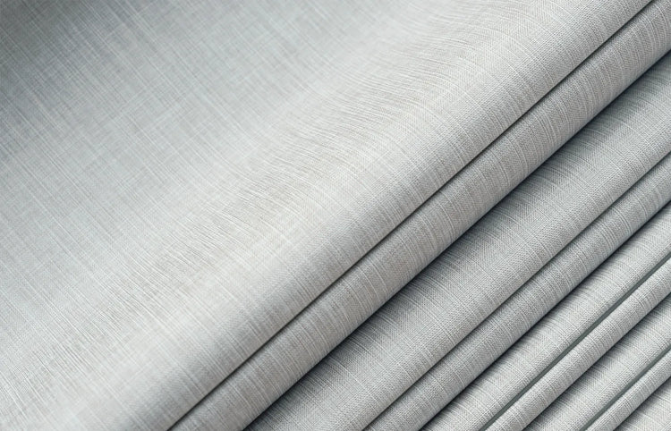 Premium blackout fabric with elegant folds enhances comfort and style in any space