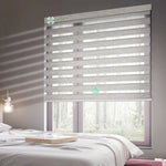 Yoolax motorized zebra shades with 70% light filtering warm silver fabric, ideal for soft light control and modern interiors
