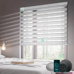 Motorized zebra roller shades with 90% room darkening greyish white fabric, ideal for soft light control and modern interiors