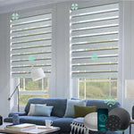 Motorized zebra roller shades with 80% room darkening luxury grey fabric, ideal for soft light control and modern interiors