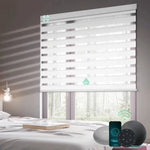 Motorized zebra roller shades with 90% room darkening white matter fabric, ideal for soft light control and modern interiors
