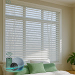 Smart wood blinds in a modern living room, compatible with remote control, smartphone, and smart home devices