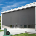 Yoolax motorized extra-wide outdoor shades with 3% openness black fabric and seamless one-piece construction, ideal for patios, balconies, pergolas, living rooms, and porches.
