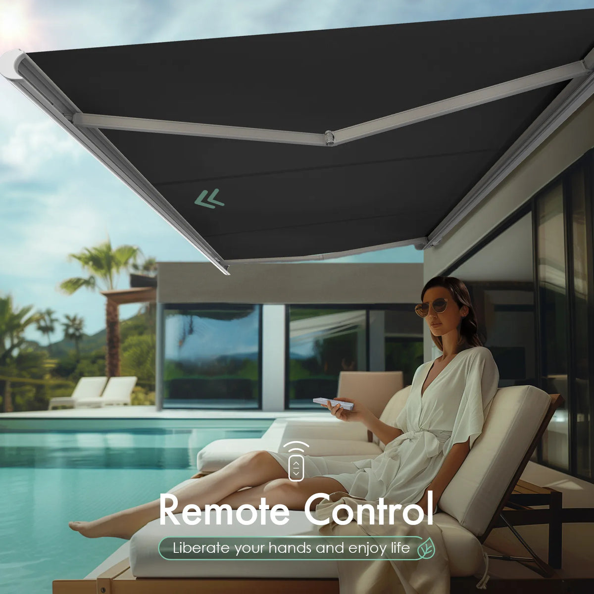 Black motorized retractable awning with remote control to liberate your hands and enjoy life outdoors.