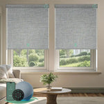 Motorized blackout roller shades with smokey grey fabric, delivering full light blockage and enhanced privacy