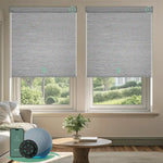 Motorized blackout roller shades with foggy grey fabric, delivering full light blockage and enhanced privacy