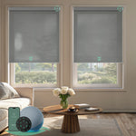 Motorized light-filtering cellular shades in dark grey fabric for living room.