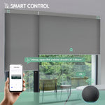 Dark grey motorized light-filtering cellular shades controllable via mobile app or Alexa.