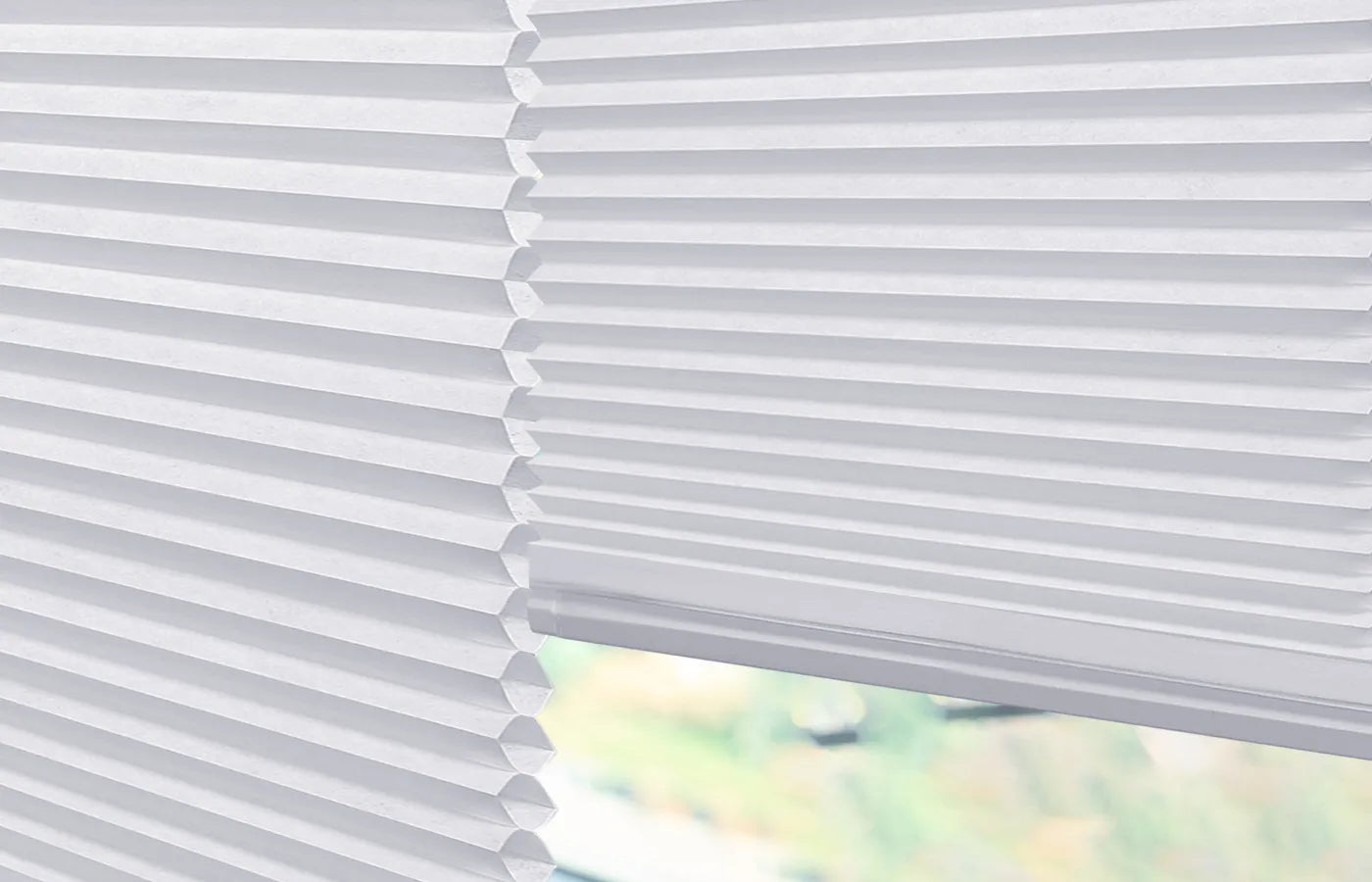 Light-filtering cellular shades with 50% light control for natural brightness and outdoor view.