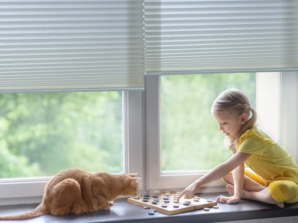 Cordless design for motorized light-filtering cellular shades, safe for homes with children and pets, eliminating pull cord entanglement risk.