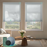 Motorized room darkening honeycomb shades in pearl fabric for living room.