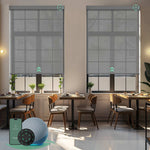 Motorized solar roller shades with 3% openness grey fabric, blocking glare and UV while preserving a clean view