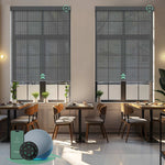 Motorized solar roller shades with 3% openness greyish black fabric, blocking glare and UV while preserving a clean view