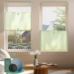 Beige motorized top down bottom up light-filtering cellular shades for flexible light control and enhanced privacy.