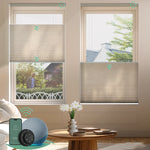 Coffee motorized top down bottom up light-filtering cellular shades for flexible light control and enhanced privacy.