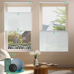 White motorized top down bottom up semi-sheer cellular shades for flexible light control and enhanced privacy.