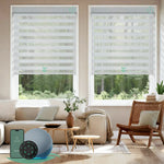 Motorized zebra blinds V-series featuring room-darkening V-Shimmer Layer White fabric, offering layered soft-light control for modern interiors.