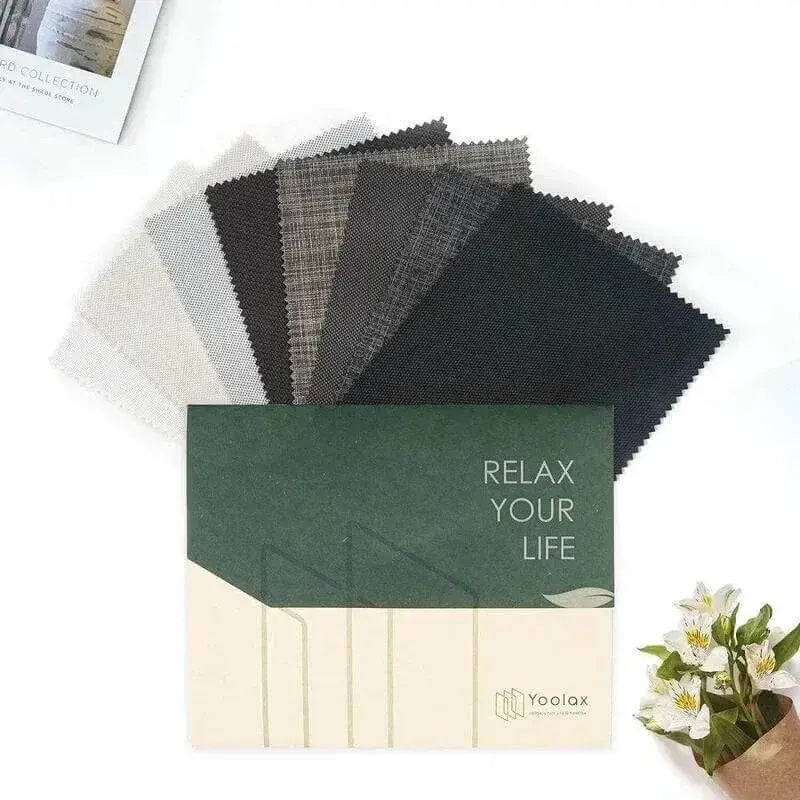 Yoolax motorized extra-wide outdoor roller shades fabric samples.